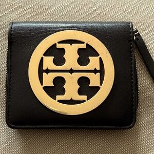 Tory Burch Black and Gold Wallet Sleek Design